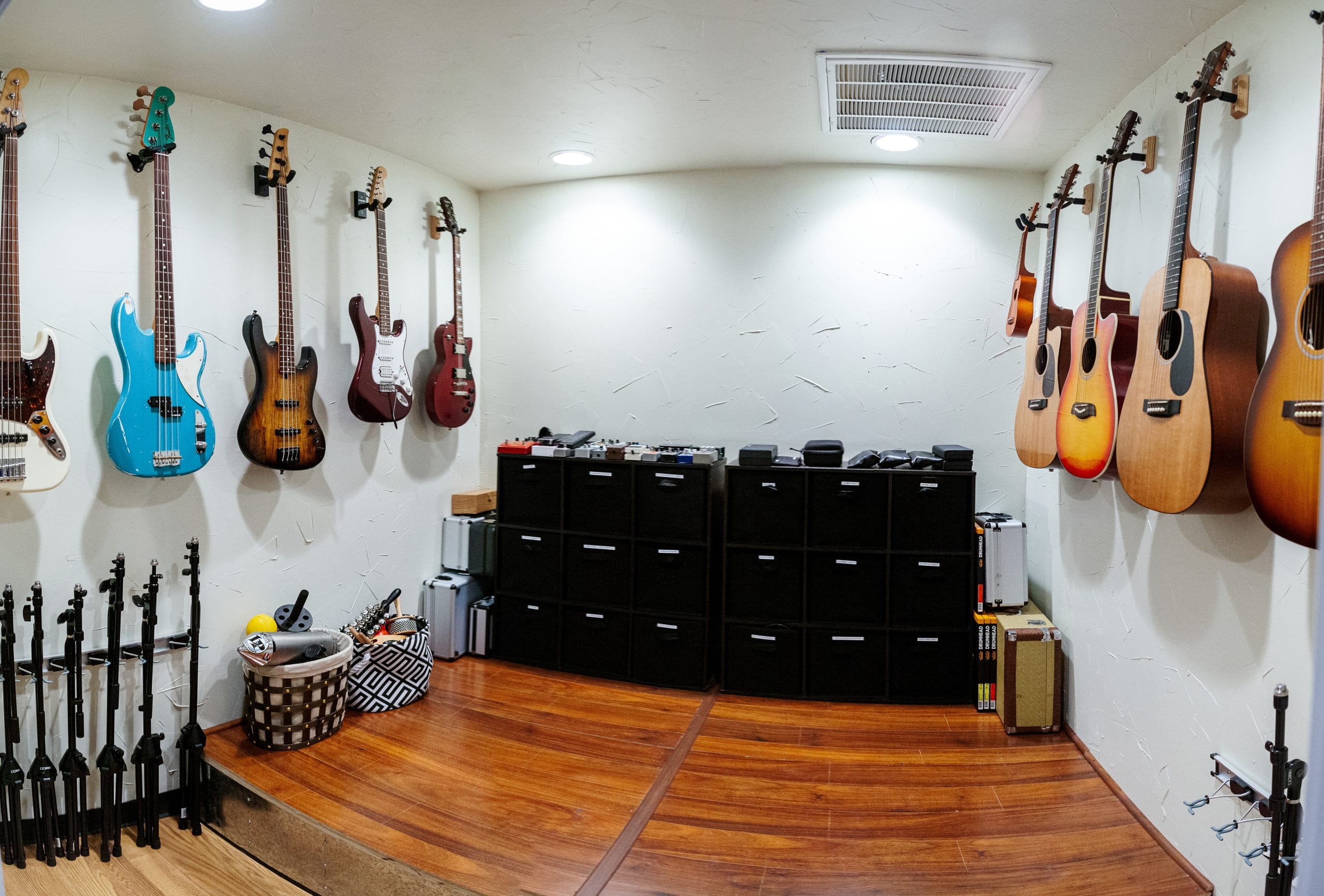 Gear room with guitars and amps
